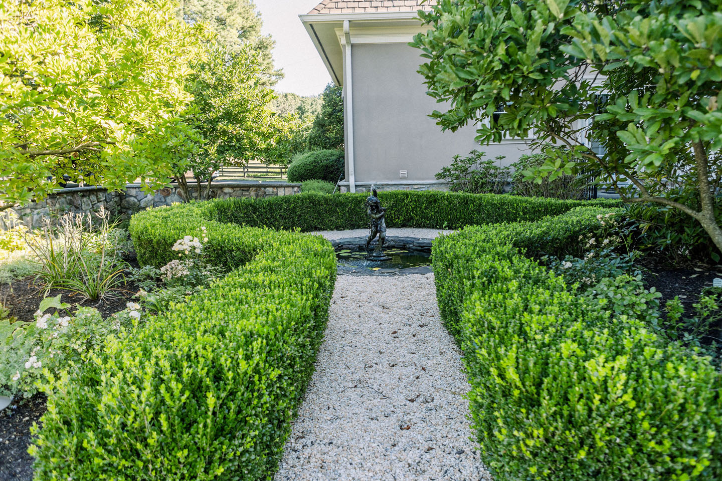 walkway with bushes